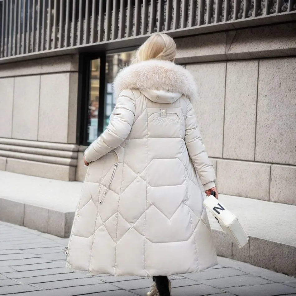 Model wearing a women's stylish quilted hooded winter coat, front view, perfect for daily wear.