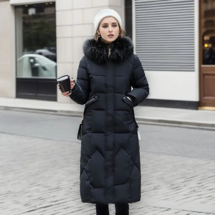 Side view of a woman in a chic quilted hooded winter coat, showcasing fit & modern style.