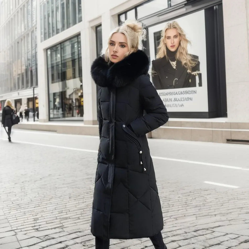 Women's quilted hooded winter coat worn outdoors, demonstrating warmth & style in cold weather.