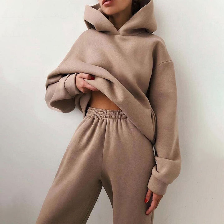 Women's relaxed fit loungewear set with cozy hoodie and soft sweatpants for ultimate home comfort.