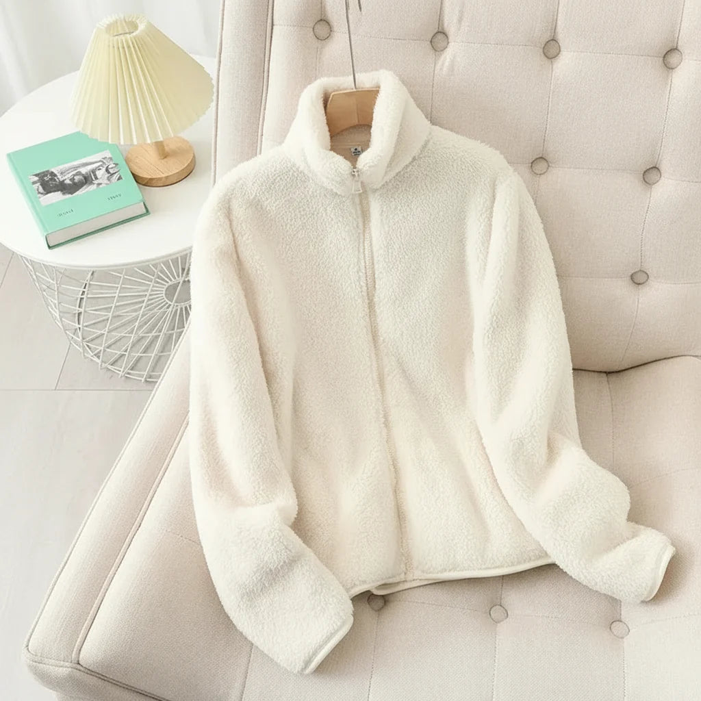Front view of women's warm high collar jacket, cozy zip-up winter outerwear for casual style.