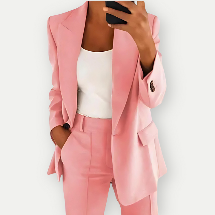 Stylish women's black blazer & trouser suit set, a versatile professional office attire ensemble. Chic look.