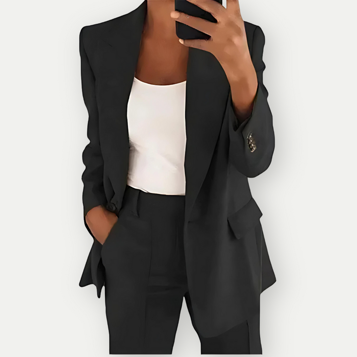 Women's fitted blazer & straight-leg trouser suit, a sophisticated professional ensemble for office wear.