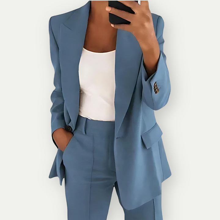 Versatile women's grey blazer & trouser suit, perfect for a chic professional look or elegant evening outfit.
