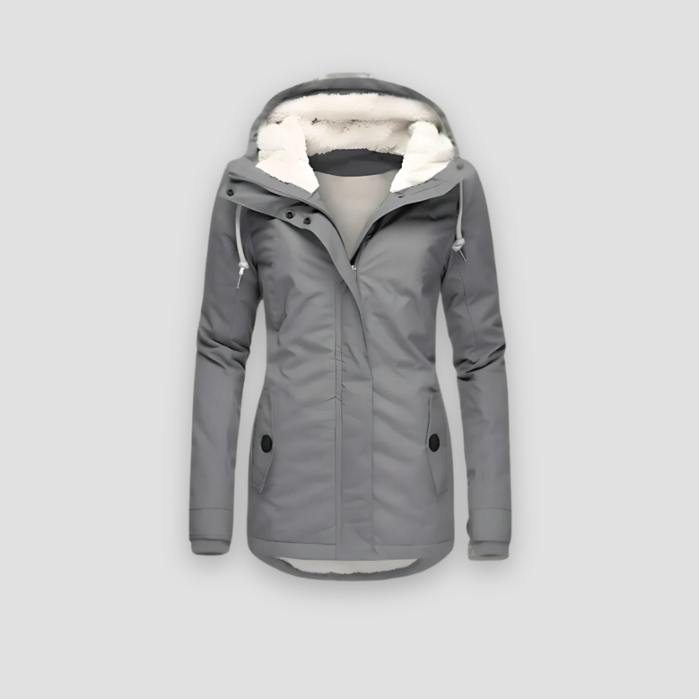 Fashionable women's waterproof quilted puffer jacket, ideal for cold weather versatility.