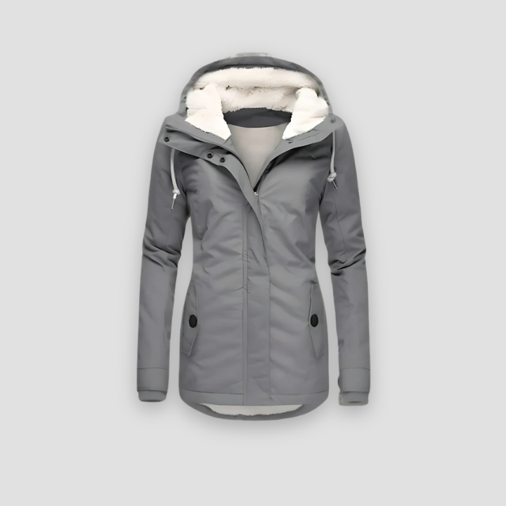 Fashionable women's waterproof quilted puffer jacket, ideal for cold weather versatility.