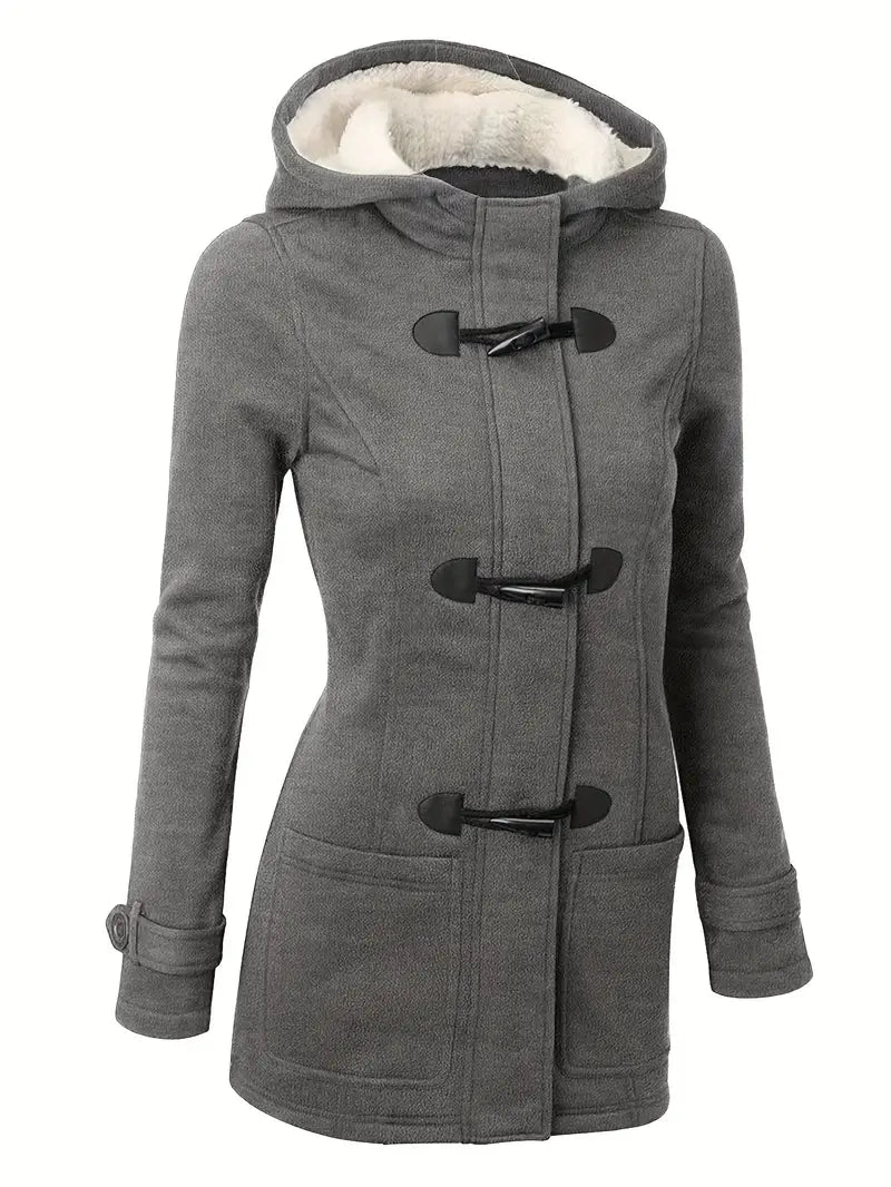 Chic women's green Caroline trench coat, an elegant and stylish outerwear for autumn and fall layering.