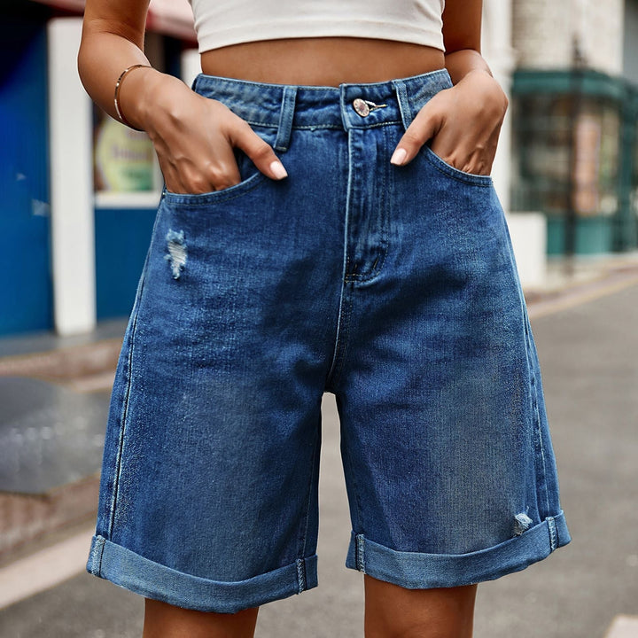 Versatile women's blue denim shorts, relaxed fit for ultimate summer comfort & trendy casual looks.
