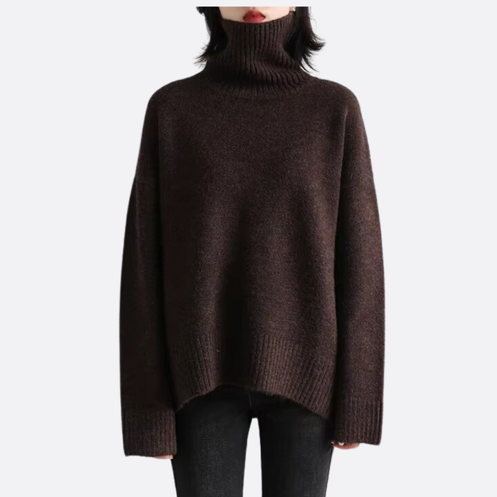Women's warm oversized turtleneck sweater in cozy knit for fall & winter chic. Relaxed fit, long sleeve.
