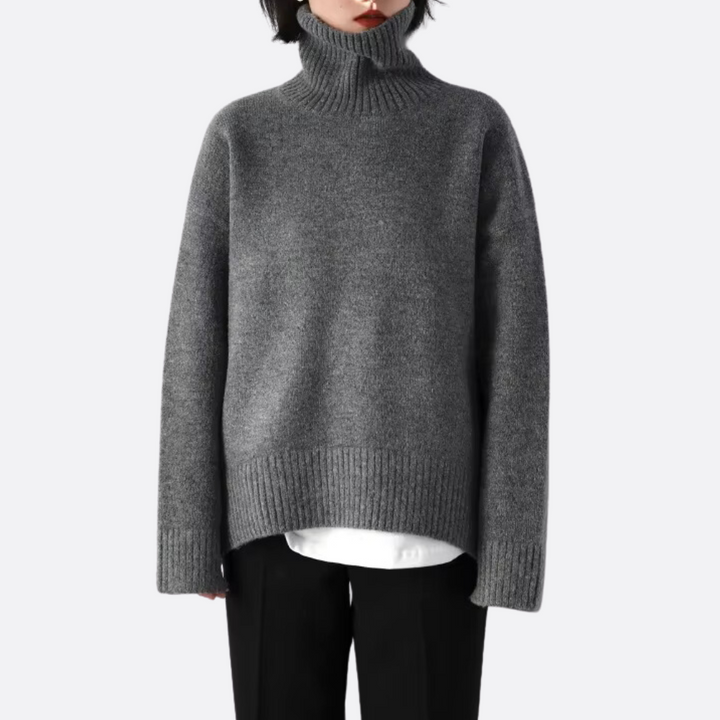 Cozy warm women's oversized turtleneck sweater. Soft knit, relaxed fit, perfect for fall & winter chic fashion.
