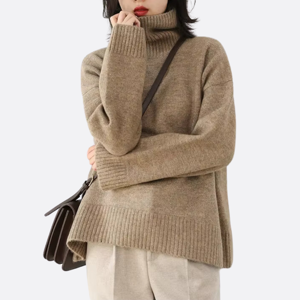 Stylish women's oversized turtleneck sweater. Warm knit, relaxed fit, long sleeve. Ideal for cozy fall/winter fashion.