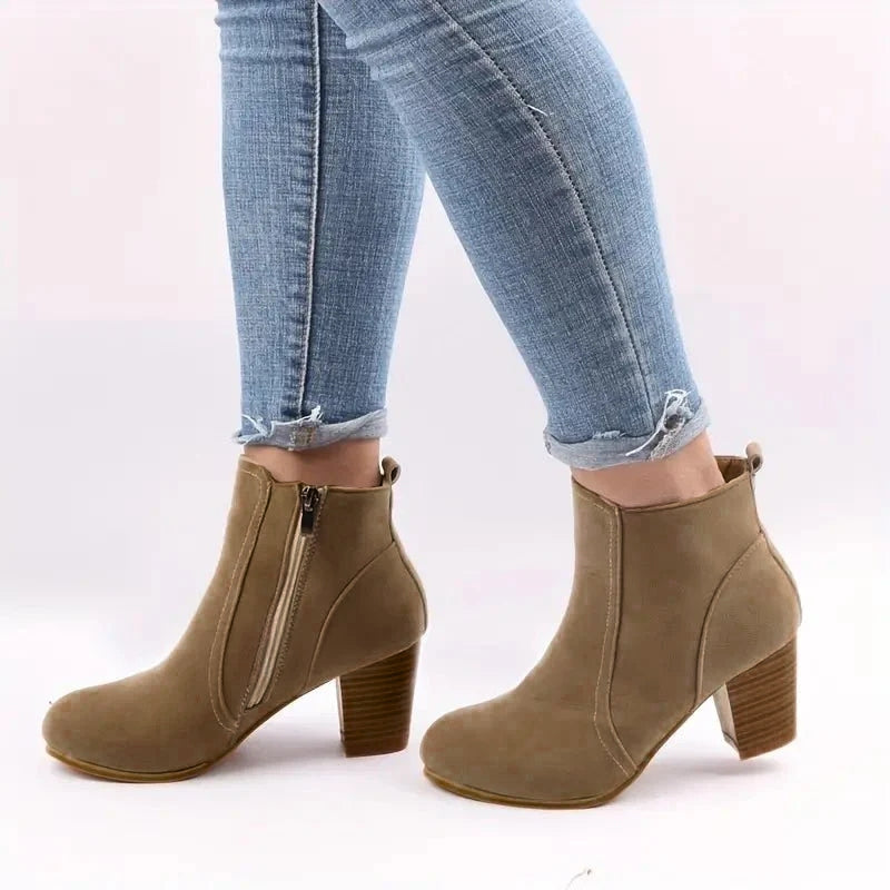 Fashionable women's block heel ankle boots designed for everyday wear with a chic side zip.