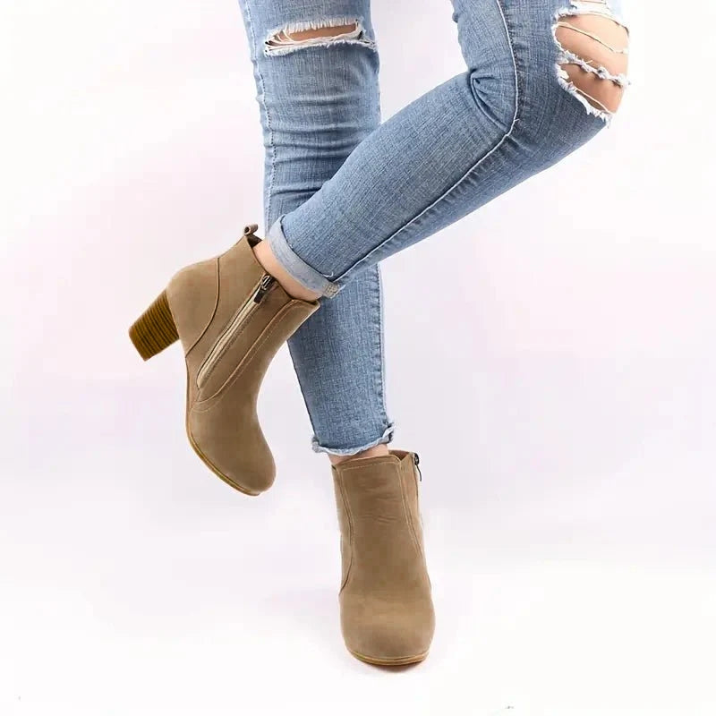 Comfortable women's ankle boots with a supportive block heel, ideal for winter style.