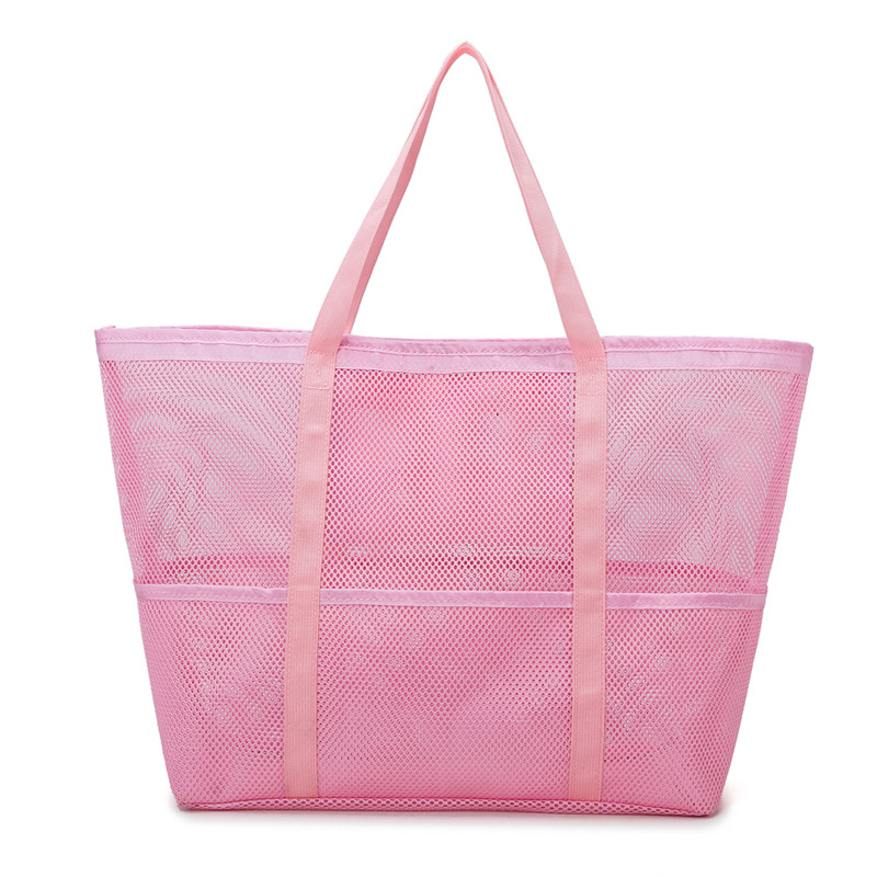 Breathable mesh beach tote, a perfect travel accessory for women's summer vacations & trips.
