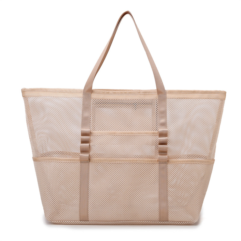 Women's large mesh beach tote bag for summer days, perfect for towels, swimwear & essentials.
