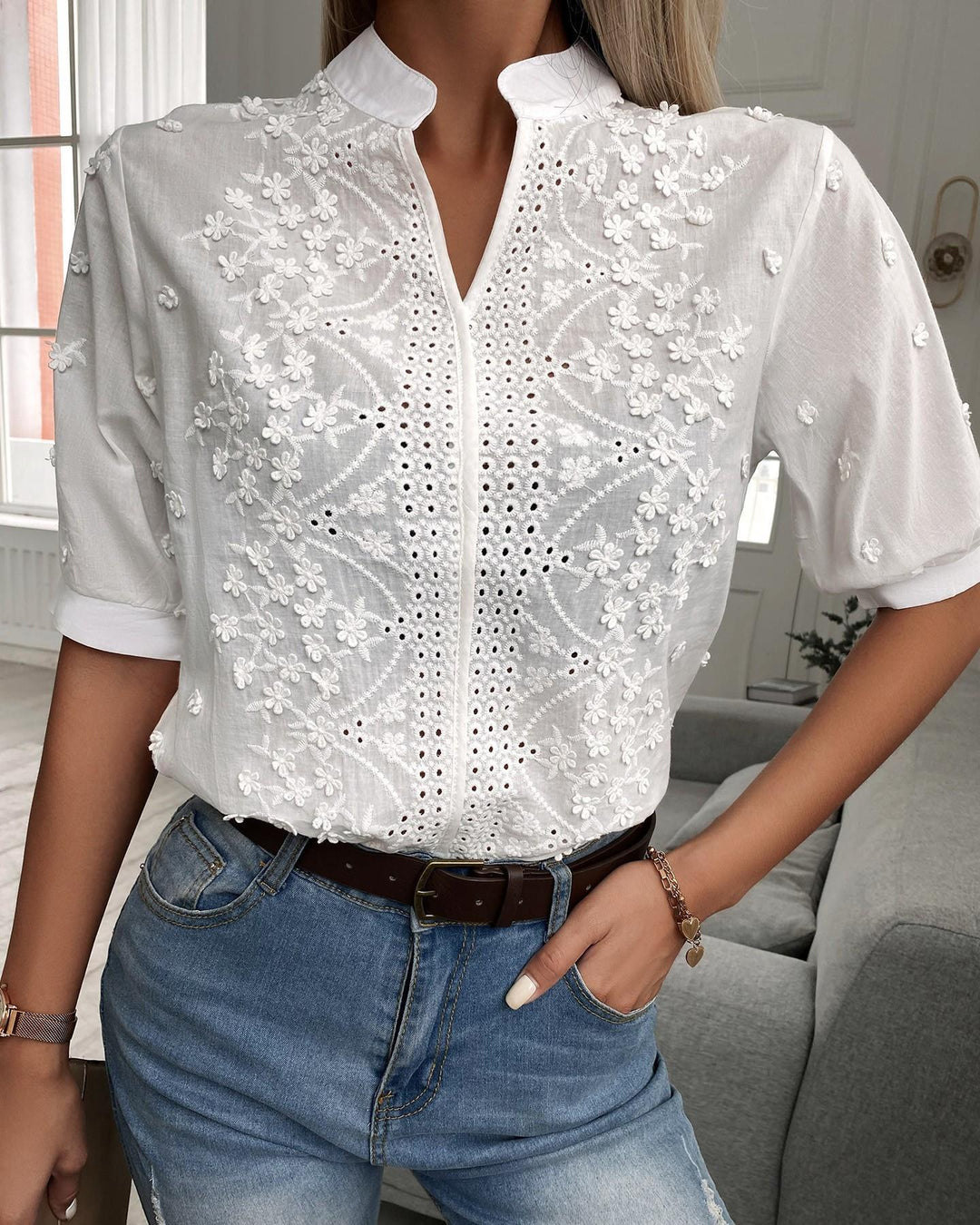 Women's elegant floral embroidered V-neck blouse with puff short sleeves, perfect for summer casual chic style.
