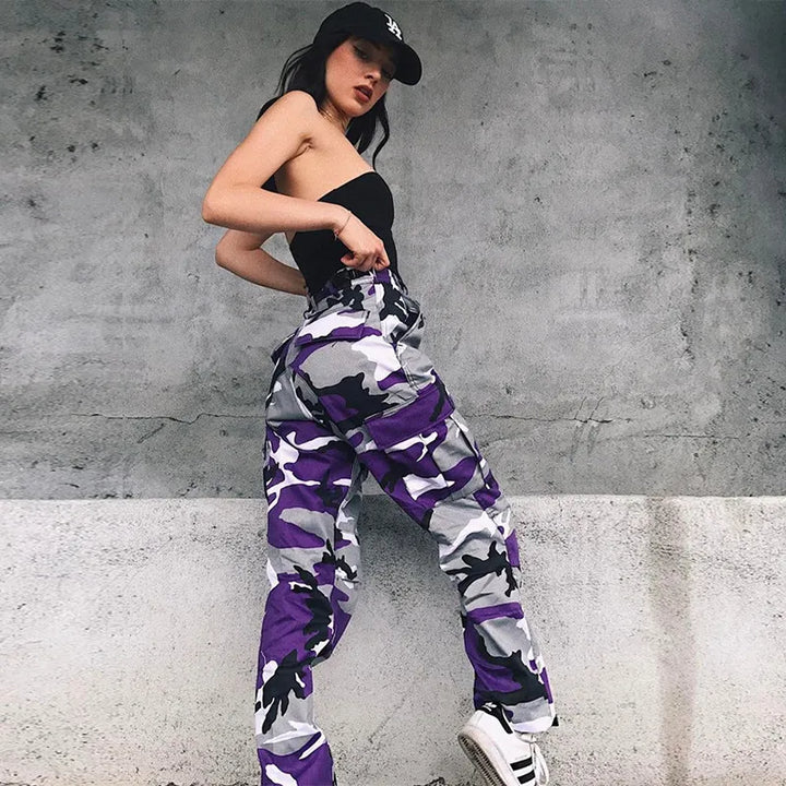 Trendy women's utility cargo pants in a camo pattern, featuring a relaxed baggy fit and cinched ankle cuffs.