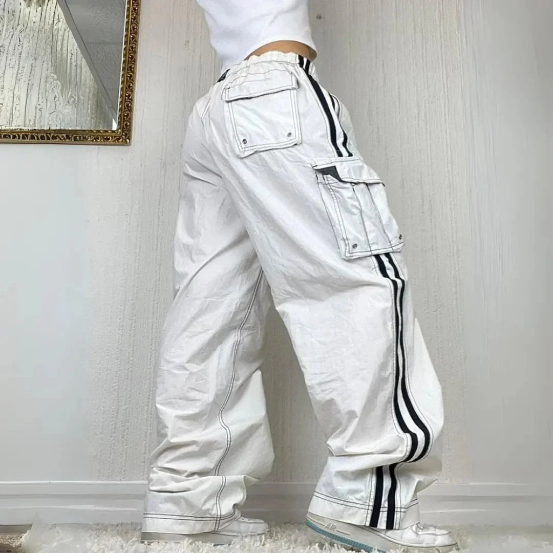 Casual women's wide leg cargo pants featuring a chic side stripe, baggy fit, and practical utility pockets.