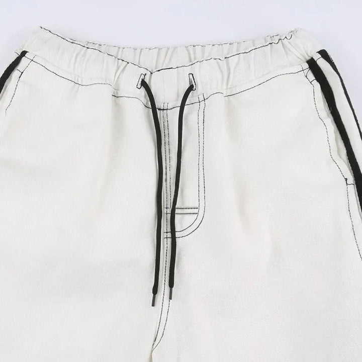 Stylish women's baggy wide leg cargo pants with a bold side stripe and practical utility pockets.
