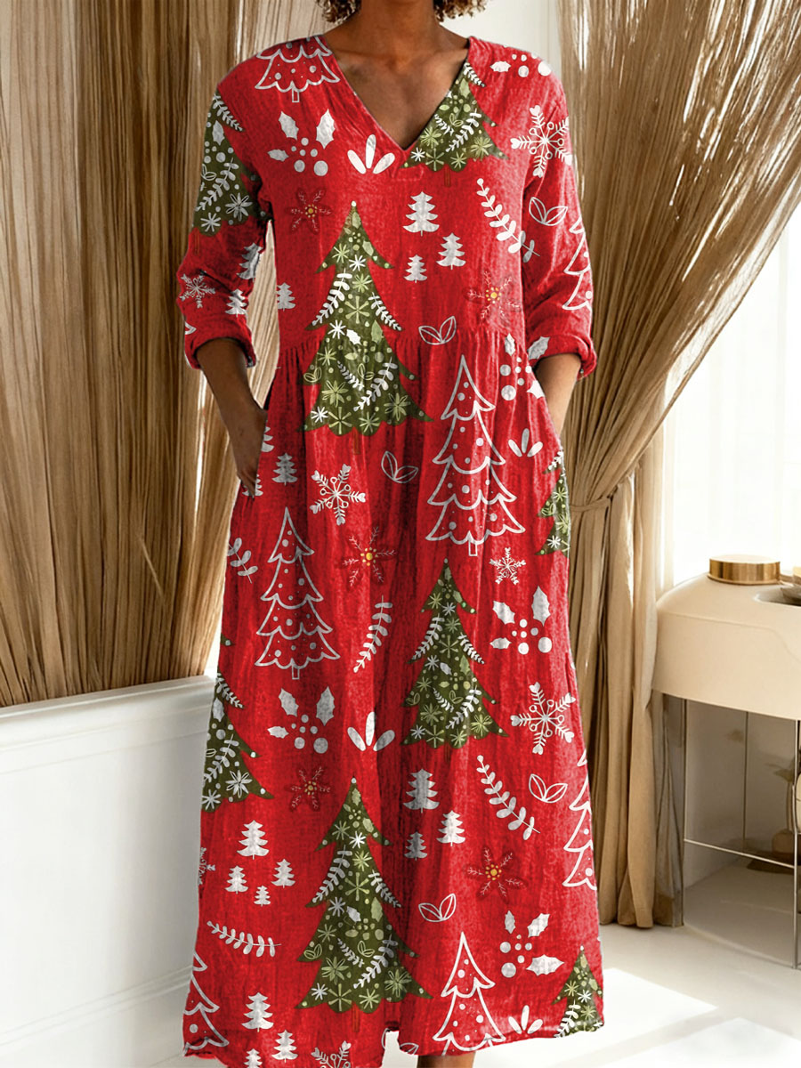Comfortable women's Christmas maxi dress featuring a festive tree & floral print. Perfect casual holiday party attire.