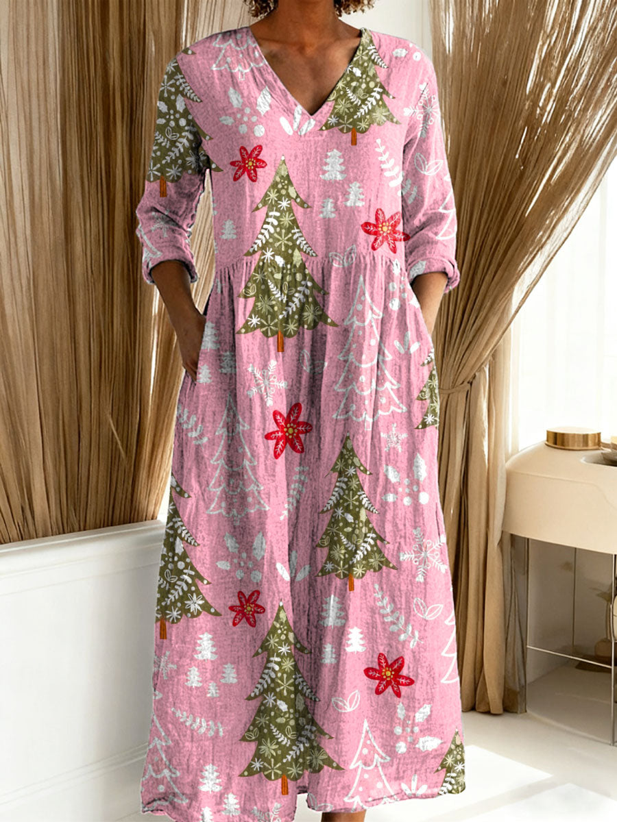 Relaxed fit women's Christmas maxi dress with a vibrant festive tree and floral print. Ideal for holiday fashion.