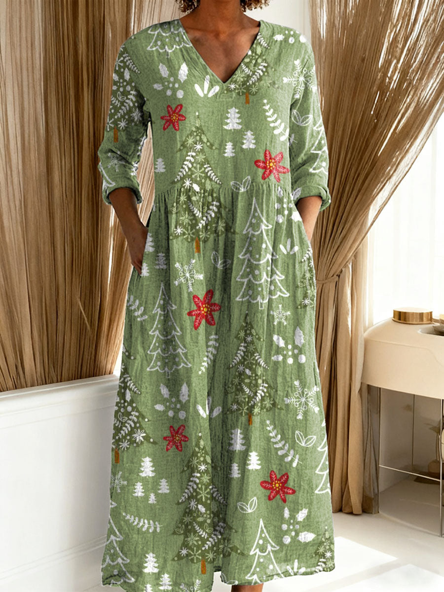 Women's Christmas maxi dress with festive tree & floral print. Comfortable V-neck holiday attire for parties.