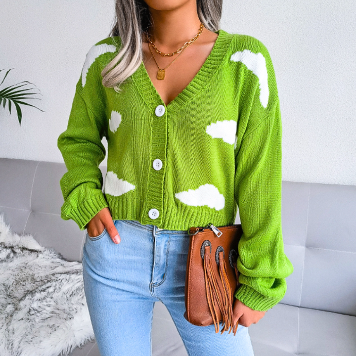 Versatile women's cropped cardigan with cloud print. V-neck, button-up, perfect for casual style or a light layer.