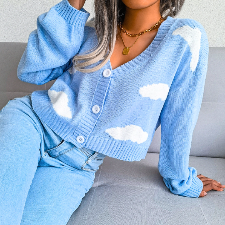 Stylish cloud print cropped cardigan for women. V-neck, button-up, a light layer for spring & summer fashion.