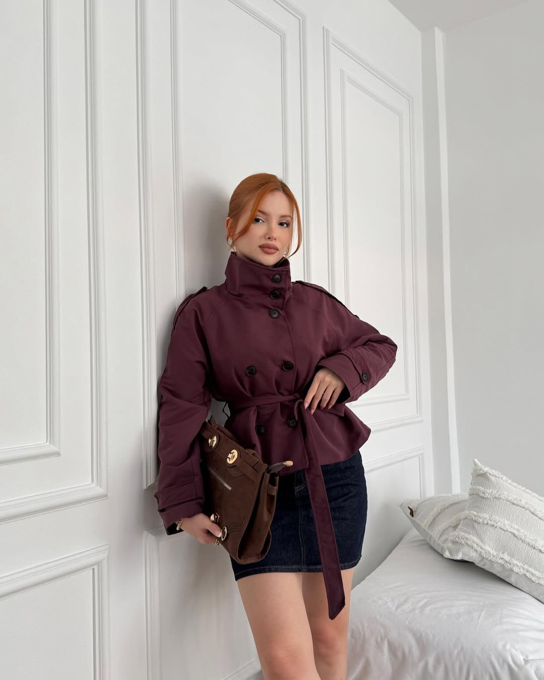 Women's belted double-breasted cropped trench coat. Chic and stylish outerwear for fall.