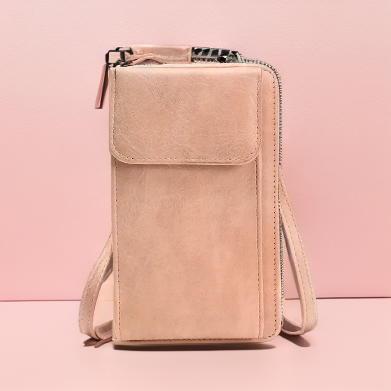 Hands-free compact women's crossbody bag in stylish vegan leather for daily essentials.