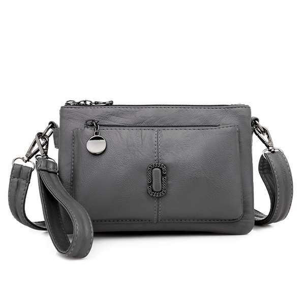 Compact women's casual sling bag, a small crossbody purse for carrying daily necessities easily.