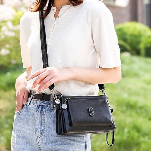 Women's small crossbody sling bag for casual everyday carry, perfect for essential items. Versatile design.