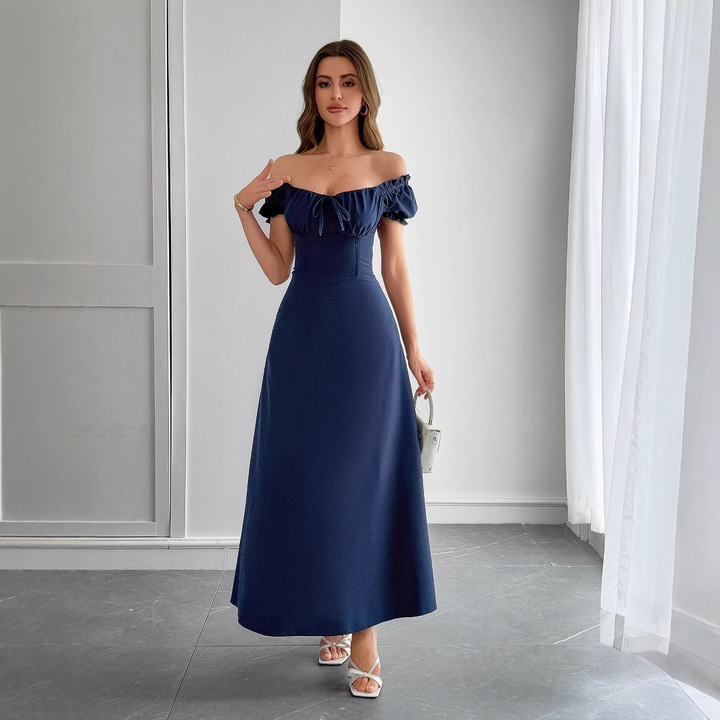 White casual women's puff sleeve maxi dress with square neckline. Perfect for a chic day look or evening event.