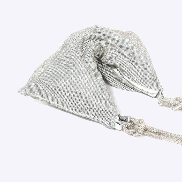 Women's shimmering rhinestone handbag. A dazzling evening bag adding sparkle to any outfit.