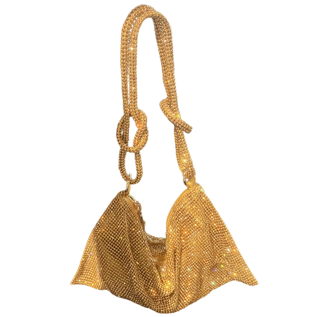 Chic women's rhinestone evening handbag. Dazzling accessory for parties, formal wear, and glam fashion.