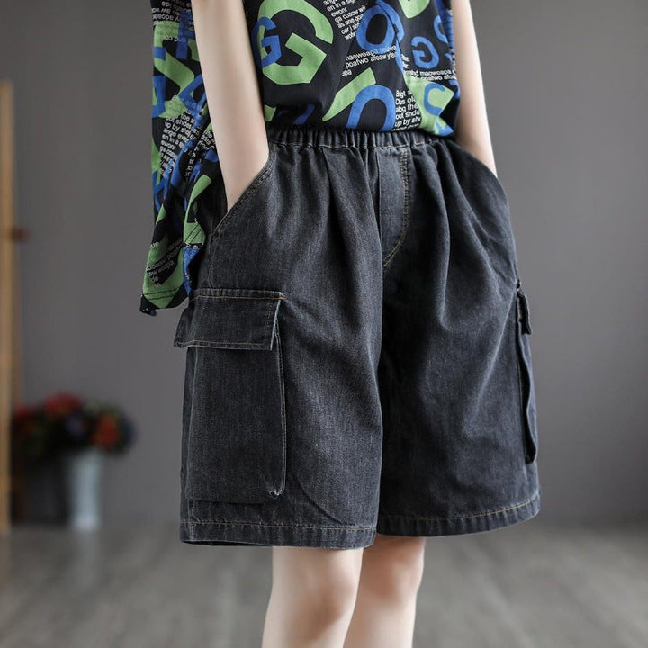 Relaxed fit women's wide leg jorts, offering a trendy baggy look. Stylish denim cargo shorts for summer fashion.