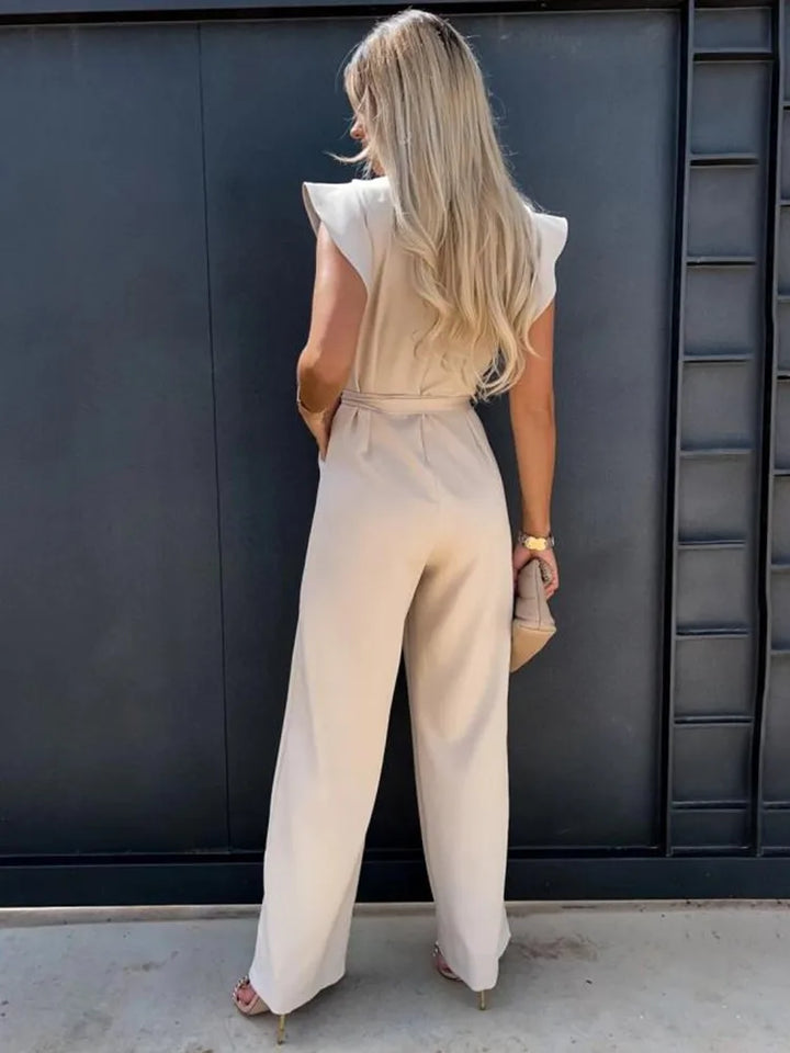 Comfortable women's flutter sleeve wide leg jumpsuit. Dressy yet relaxed, ideal for spring/summer occasion wear.