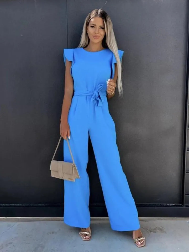Versatile women's elegant flutter sleeve wide leg jumpsuit, easily transitioning from day to night events.