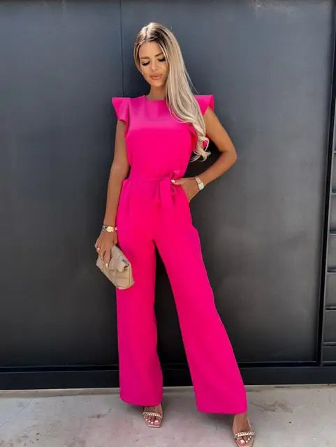 Chic women's wide leg flutter sleeve jumpsuit. Elegant formal wear, perfect for spring/summer fashion.