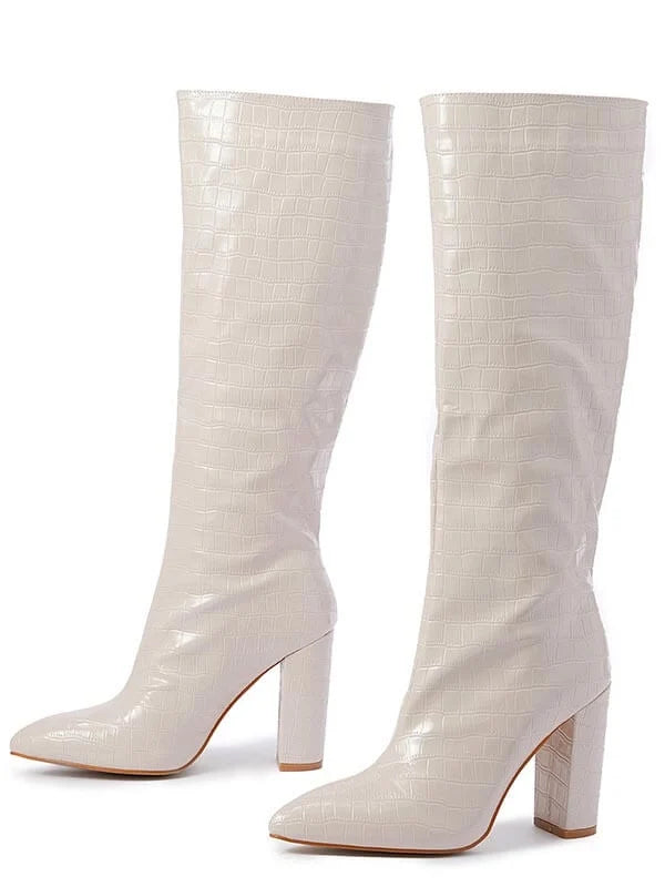Stylish white pointed toe knee high boots for women, designed with a comfortable block heel. Ideal for chic winter style.