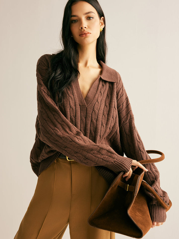 Chunky knitted women's brown jumper, cable knit texture, collared V-neck. Versatile for smart casual winter.