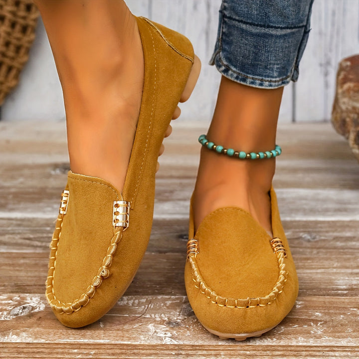 Women's slip-on loafers with soft footbed for all-day comfort and casual wear.
