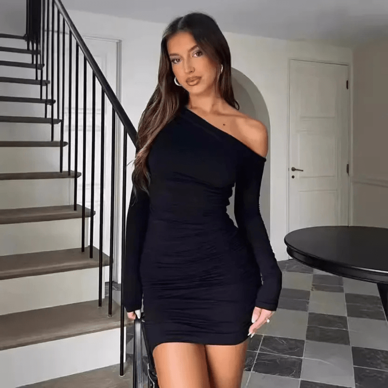 Chic black bodycon ruched mini dress with a stylish one-shoulder long sleeve, ideal for evening wear.