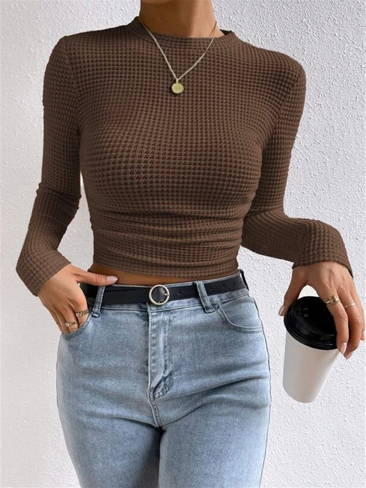 Soft women's textured long sleeve top with a classic crew neck for ultimate comfort.