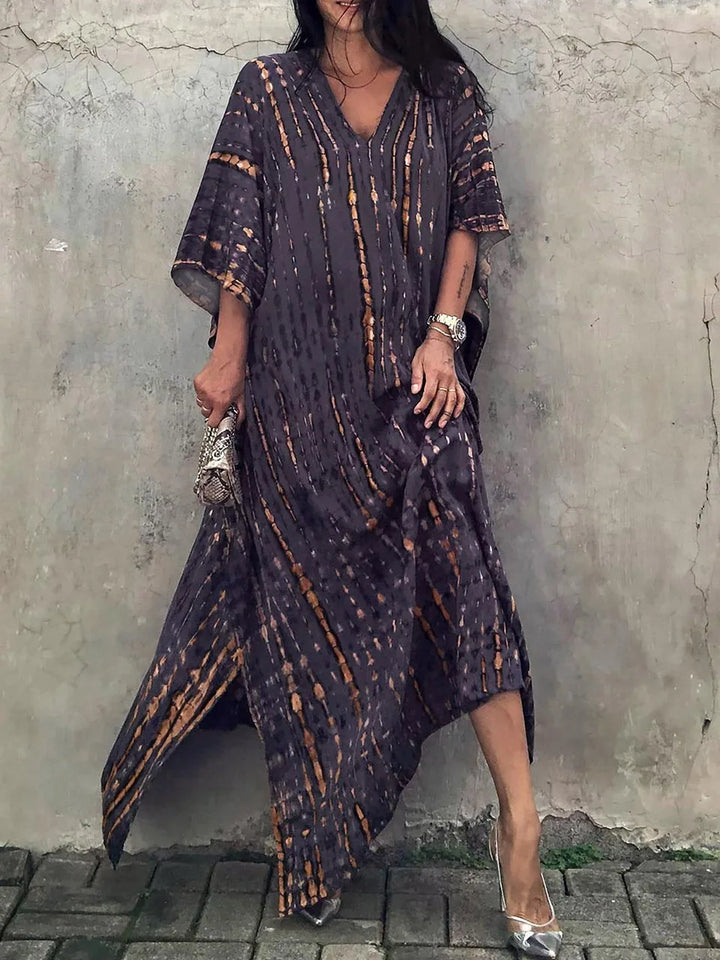 Women's festival-ready boho tie-dye maxi dress. Vibrant, long & flowy for ultimate comfort.