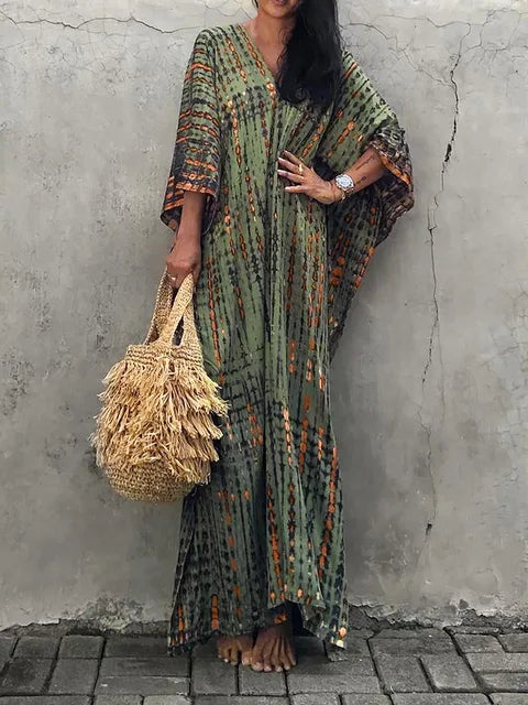 Multi-color vibrant women's boho tie-dye maxi dress. Relaxed fit summer casual & beachwear.