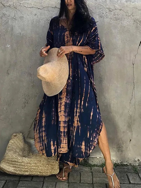 Comfortable & vibrant women's tie-dye maxi dress. Relaxed boho style for casual summer fashion.
