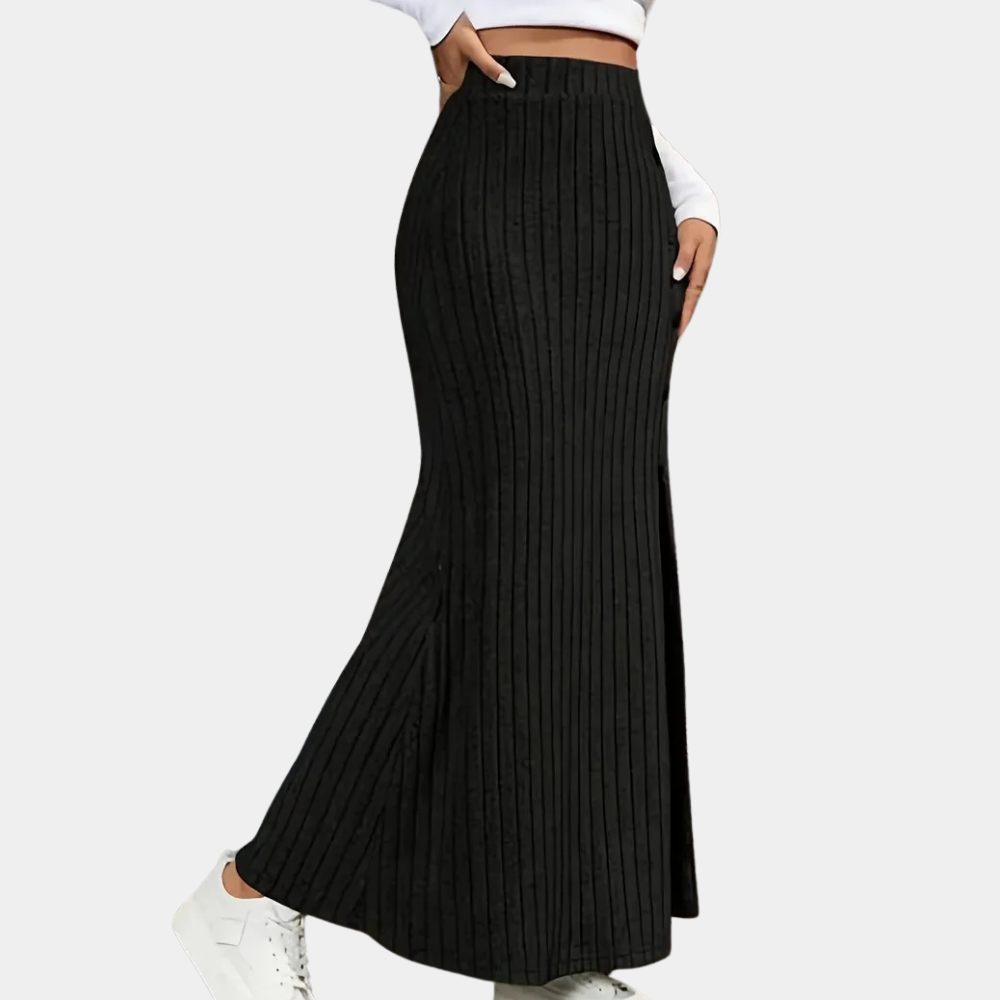 Flattering women's long fitted skirt with a modern side slit & subtle button details. Perfect for an elegant look.