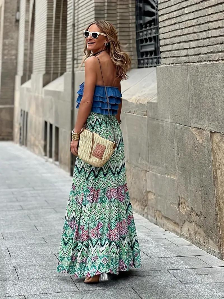 Effortless women's long tiered maxi skirt in a-line cut, ideal for summer vacation outfits.