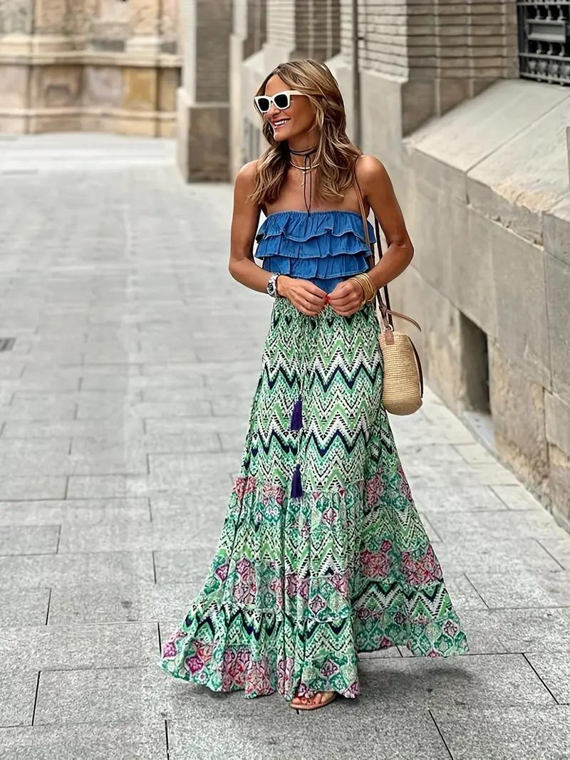 Women's flowing tiered maxi skirt with vibrant print, perfect for summer fashion & boho style.